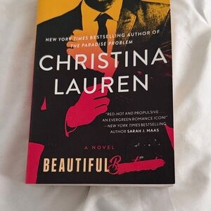 Christina Lauren Novel with Striking Red and Black Design